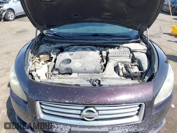 2012 Nissan Maxima S z VIN 1N4AA5AP2CC864308, wystawiony jako IAAI lot #43089617 z przebiegiem 227 515 mil mil oraz . Historia ofert i sprzedaży dostępna na DreamBid. Obrazek 10.