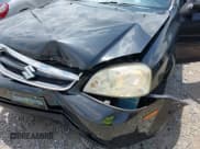 ✅ 2006 Suzuki Forenza • VIN: KL5JD56Z26K338417 • Lot: 42468572. Wystawiony na IAAI z przebiegiem 110 207 mil. Bezpłatny archiwum sprzedaży aukcyjnych z USA i szczegółowy raport historii pojazdu na DreamBid. Zdjęcie 6.