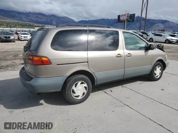 ✅ 1999 Toyota Sienna LE • VIN: 4T3ZF13C2XU134628 • Лот: 84294315. Опубликован ранее на Copart с пробегом 211 607 миль. Бесплатный доступ к архиву аукционных продаж из США и подробный отчёт об истории автомобиля на DreamBid. Изображение 3.