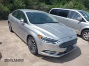 ✅ 2017 Ford Fusion Hybrid Titanium • VIN: 3FA6P0RU1HR317556 • Lot: 42549706. Listed on IAAI with 77,744 mi. Free auction sales archive from the USA and detailed vehicle history report at DreamBid. Image 1.