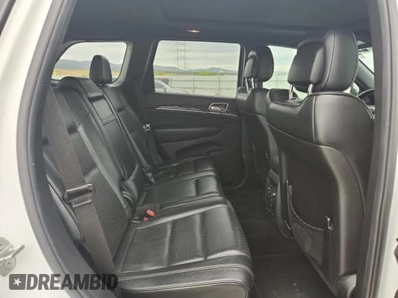 ✅ 2015 Jeep Grand Cherokee Overland • VIN: 1C4RJFCM9FC866700 • Lot: 86303435. Listed on Copart with 86,831 mi. Free auction sales archive from the USA and detailed vehicle history report at DreamBid. Image 11.