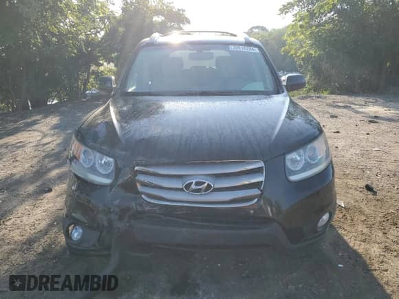 2012 Hyundai Santa Fe Limited с VIN 5XYZK4AG5CG141536, выставлен на аукционе Copart как лот 70818284 с пробегом 151 235 миль миль и Списание • Salvage title. История ставок и продаж доступна на DreamBid. Изображение 5.
