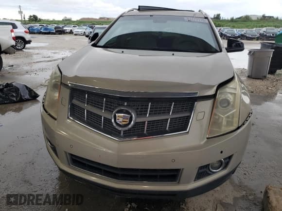 ✅ 2011 Cadillac SRX Premium Collection • VIN: 3GYFNCEY2BS576223 • Lot: 93982685. Wystawiony na Copart z przebiegiem Nie podano. Bezpłatny archiwum sprzedaży aukcyjnych z USA i szczegółowy raport historii pojazdu na DreamBid. Zdjęcie 5.