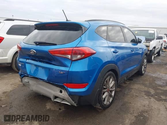 2017 Hyundai Tucson Sport with VIN KM8J33A2XHU444886, listed as a IAAI auction lot 41485774 with 103,159 mi miles and . Bid and sale history available at DreamBid. Image 4.