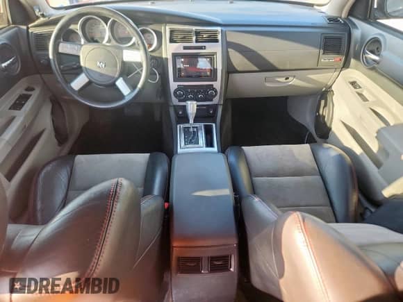 2006 Dodge Charger SRT-8 с VIN 2B3KA73W96H288105, выставлен на аукционе Copart как лот 84009015 с пробегом 83 880 миль миль и Списание • Salvage title. История ставок и продаж доступна на DreamBid. Изображение 8.