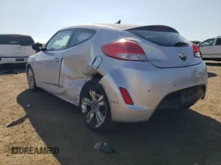 ✅ 2014 Hyundai Veloster • VIN: KMHTC6AD2EU191070 • Lot: 70097094. Wystawiony na Copart z przebiegiem 65 384 mil. Bezpłatny archiwum sprzedaży aukcyjnych z USA i szczegółowy raport historii pojazdu na DreamBid. Zdjęcie 2.