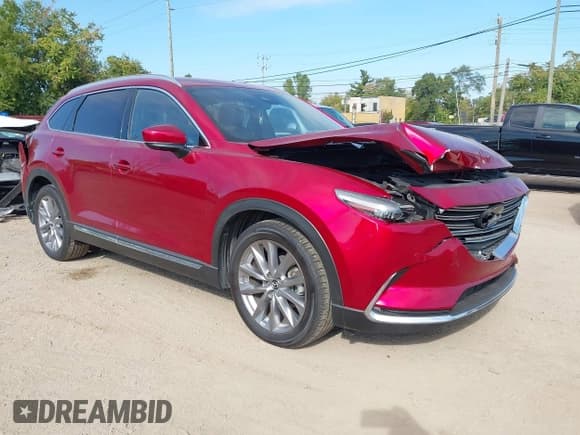 ✅ 2021 Mazda CX-9 Grand Touring • VIN: JM3TCBDY2M0524053 • Lot: 43450570. Listed on IAAI with 88,807 mi. Free auction sales archive from the USA and detailed vehicle history report at DreamBid. Image 1.