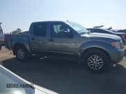 ✅ 2018 Nissan Frontier SV • VIN: 1N6AD0ER9JN761322 • Lot: 42995099. Listed on IAAI with 154,479 mi. Free auction sales archive from the USA and detailed vehicle history report at DreamBid. Image 13.