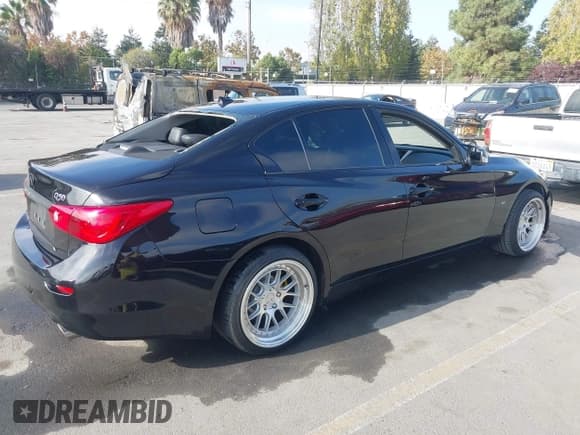 ✅ 2015 Infiniti Q50 Premium • VIN: JN1BV7AP2FM353956 • Lot: 43582313. Listed on IAAI with 123,573 mi. Free auction sales archive from the USA and detailed vehicle history report at DreamBid. Image 4.