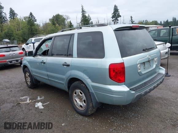 ✅ 2003 Honda Pilot EX • VIN: 2HKYF18523H511420 • Lot: 42934551. Listed on IAAI with 248,515 mi. Free auction sales archive from the USA and detailed vehicle history report at DreamBid. Image 3.