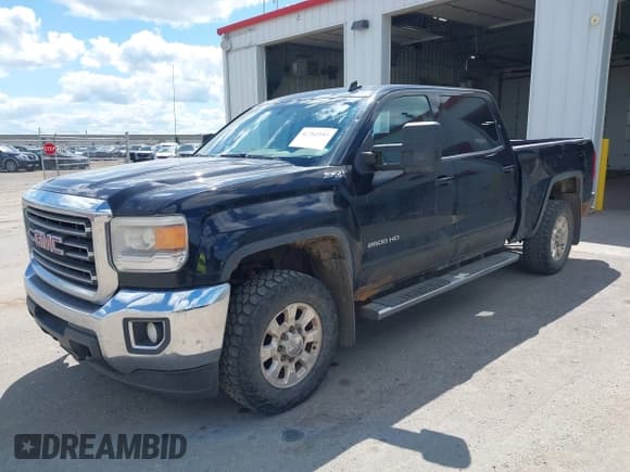 ✅ 2015 GMC Sierra 2500HD SLE • VIN: 1GT12YEG1FF195650 • Lot: 42762103. Listed on IAAI with 199,602 mi. Free auction sales archive from the USA and detailed vehicle history report at DreamBid. Image 19.