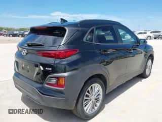 2021 Hyundai Kona SEL Plus z VIN KM8K6CAA4MU742542, wystawiony jako IAAI lot #42752287 z przebiegiem 107 891 mil mil oraz . Historia ofert i sprzedaży dostępna na DreamBid. Obrazek 4.