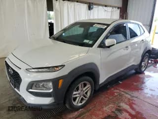 ✅ 2021 Hyundai Kona SE • VIN: KM8K1CAA0MU676781 • Лот: 62313235. Опубликован ранее на Copart с пробегом 58 178 миль. Бесплатный доступ к архиву аукционных продаж из США и подробный отчёт об истории автомобиля на DreamBid. Изображение 1.