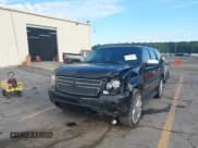 ✅ 2009 Chevrolet Tahoe LTZ • VIN: 1GNFC33079R108257 • Lot: 43346778. Listed on IAAI with 296,581 mi. Free auction sales archive from the USA and detailed vehicle history report at DreamBid. Image 2.