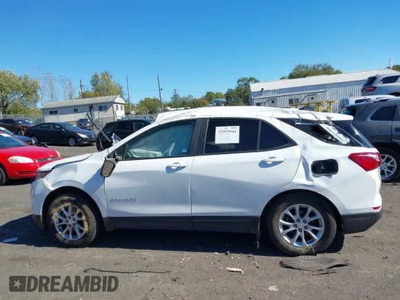 ✅ 2021 Chevrolet Equinox LS • VIN: 3GNAXSEV9MS177393 • Lot: 43393944. Listed on IAAI with 65,872 mi. Free auction sales archive from the USA and detailed vehicle history report at DreamBid. Image 14.