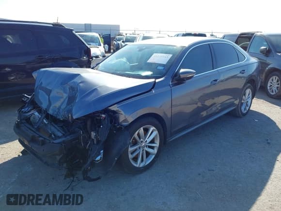 ✅ 2020 Volkswagen Passat SE • VIN: 1VWSA7A34LC027113 • Лот: 41230343. Опубликован ранее на IAAI с пробегом 74 992 миль. Бесплатный доступ к архиву аукционных продаж из США и подробный отчёт об истории автомобиля на DreamBid. Изображение 2.