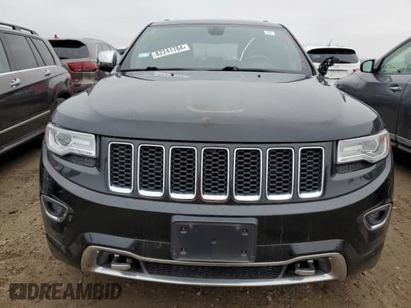 ✅ 2015 Jeep Grand Cherokee Overland • VIN: 1C4RJFCM7FC880093 • Lot: 82241784. Listed on Copart with 158,346 mi. Free auction sales archive from the USA and detailed vehicle history report at DreamBid. Image 5.