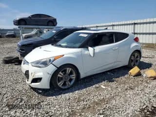 ✅ 2013 Hyundai Veloster w/Gray Int • VIN: KMHTC6AD1DU117136 • Lot: 69376474. Wystawiony na Copart z przebiegiem 153 824 mil. Bezpłatny archiwum sprzedaży aukcyjnych z USA i szczegółowy raport historii pojazdu na DreamBid. Zdjęcie 1.
