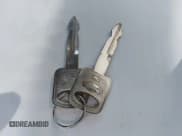 ✅ 1997 Ford Thunderbird LX • VIN: 1FALP6246VH126650 • Лот: 42219698. Опубликован ранее на IAAI с пробегом 69 880 миль. Бесплатный доступ к архиву аукционных продаж из США и подробный отчёт об истории автомобиля на DreamBid. Изображение 11.