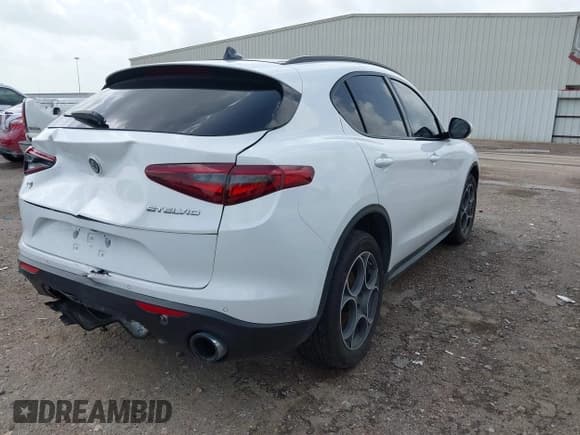 ✅ 2018 Alfa Romeo Stelvio Sport • VIN: ZASFAKPN0J7B81783 • Lot: 42590761. Listed on IAAI with 87,937 mi. Free auction sales archive from the USA and detailed vehicle history report at DreamBid. Image 4.