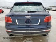✅ 2019 Bentley Bentayga V8 • VIN: SJAAM2ZV9KC024691 • Lot: 59217965. Listed on Copart with 33,243 mi. Free auction sales archive from the USA and detailed vehicle history report at DreamBid. Image 6.