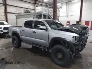 ✅ 2020 Toyota Tacoma TRD Off Road • VIN: 3TMCZ5ANXLM312421 • Лот: 43586425. Опубликован ранее на IAAI с пробегом Не указан. Бесплатный доступ к архиву аукционных продаж из США и подробный отчёт об истории автомобиля на DreamBid. Изображение 1.