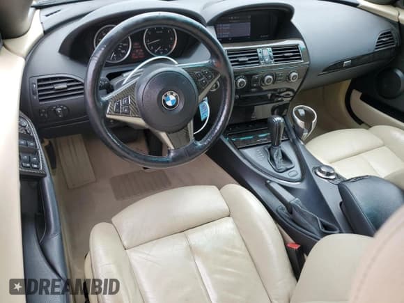 ✅ 2007 BMW 6 Series 650i • VIN: WBAEK13567CN83709 • Lot: 60728115. Wystawiony na Copart z przebiegiem 98 869 mil. Bezpłatny archiwum sprzedaży aukcyjnych z USA i szczegółowy raport historii pojazdu na DreamBid. Zdjęcie 8.
