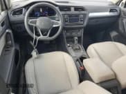 ✅ 2023 Volkswagen Tiguan S • VIN: 3VVRB7AX6PM044809 • Lot: 81716895. Listed on Copart with 15,930 mi. Free auction sales archive from the USA and detailed vehicle history report at DreamBid. Image 8.