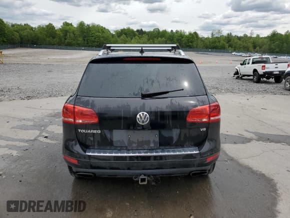 ✅ 2012 Volkswagen Touareg Sport • VIN: WVGEF9BP7CD009824 • Lot: 58311915. Listed on Copart with 154,397 mi. Free auction sales archive from the USA and detailed vehicle history report at DreamBid. Image 6.