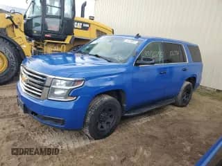 2019 Chevrolet Tahoe Commercial with VIN 1GNSKDEC9KR403672, listed as a Copart auction lot 82063155 with 102,728 mi miles and Clean title. Bid and sale history available at DreamBid. Image 1.
