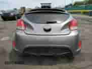 2012 Hyundai Veloster w/Gray Int с VIN KMHTC6AD0CU076898, выставлен на аукционе Copart как лот 69108635 с пробегом Не указан миль и На запчасти • Non repairable. История ставок и продаж доступна на DreamBid. Изображение 6.