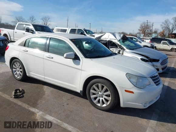 ✅ 2010 Chrysler Sebring Limited • VIN: 1C3CC5FB4AN162667 • Lot: 43912787. Listed on IAAI with 133,550 mi. Free auction sales archive from the USA and detailed vehicle history report at DreamBid. Image 1.