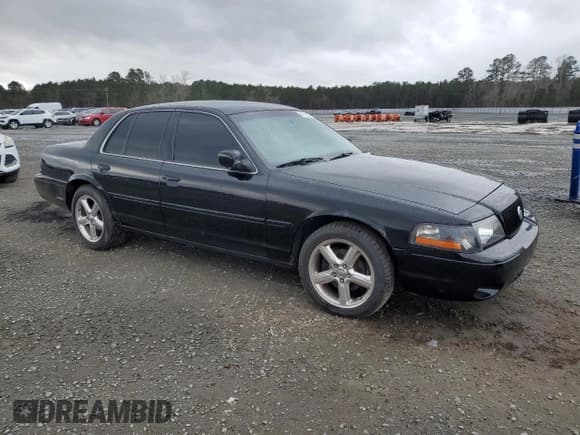 ✅ 2003 Mercury Marauder • VIN: 2MEHM75V03X633896 • Лот: 47188565. Опубликован ранее на Copart с пробегом 154 154 миль. Бесплатный доступ к архиву аукционных продаж из США и подробный отчёт об истории автомобиля на DreamBid. Изображение 4.