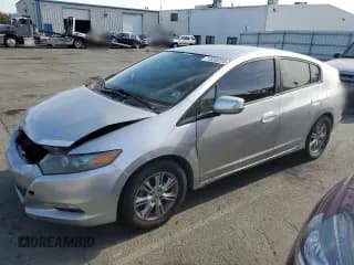 ✅ 2010 Honda Insight EX • VIN: JHMZE2H78AS019292 • Лот: 71830224. Опубликован ранее на Copart с пробегом 184 715 миль. Бесплатный доступ к архиву аукционных продаж из США и подробный отчёт об истории автомобиля на DreamBid. Изображение 1.