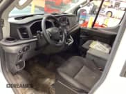 ✅ 2022 Ford Transit Cargo • VIN: 1FTBR1CG6NKA06474 • Lot: 42521100. Listed on IAAI with 82,772 mi. Free auction sales archive from the USA and detailed vehicle history report at DreamBid. Image 1.