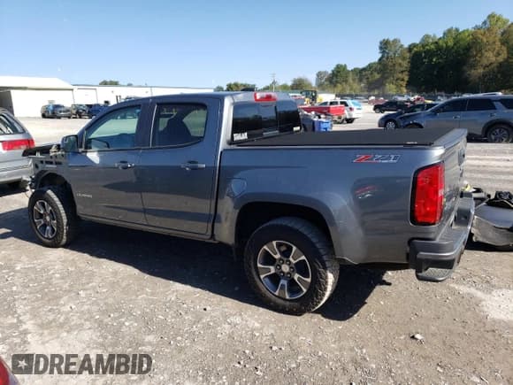 ✅ 2018 Chevrolet Colorado 4WD Z71 • VIN: 1GCGTDEN8J1272549 • Лот: 72601324. Опубликован ранее на Copart с пробегом 26 329 миль. Бесплатный доступ к архиву аукционных продаж из США и подробный отчёт об истории автомобиля на DreamBid. Изображение 2.