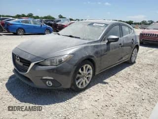 ✅ 2015 Mazda 3 S Touring • VIN: JM1BM1L3XF1230320 • Lot: 63292425. Listed on Copart with 125,942 mi. Free auction sales archive from the USA and detailed vehicle history report at DreamBid. Image 1.