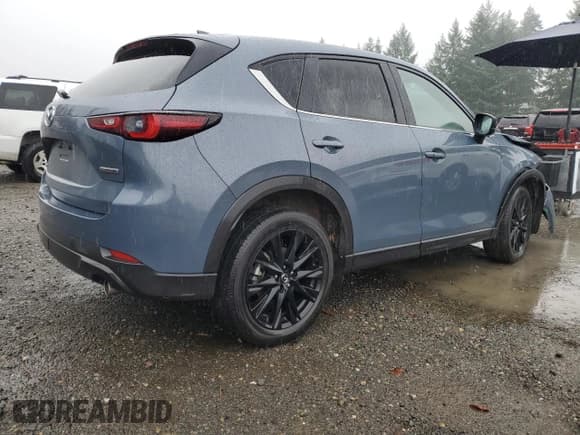 ✅ 2023 Mazda CX-5 S Carbon Edition • VIN: JM3KFBCM2P0285545 • Лот: 92729195. Опубликован ранее на Copart с пробегом 22 401 миль. Бесплатный доступ к архиву аукционных продаж из США и подробный отчёт об истории автомобиля на DreamBid. Изображение 3.