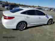 2015 Hyundai Azera z VIN KMHFG4JG1FA472859, wystawiony jako Copart lot #80162484 z przebiegiem 187 344 mil mil oraz Czysty tytuł • Clean title. Historia ofert i sprzedaży dostępna na DreamBid. Obrazek 3.