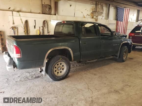 2001 Dodge Dakota Sport with VIN 1B7HG2AZ51S306530, listed as a Copart auction lot 60946554 with Not provided miles and Clean title. Bid and sale history available at DreamBid. Image 3.