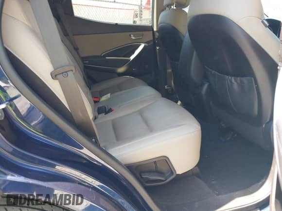 2017 Hyundai Santa Fe 2.4L z VIN 5XYZU3LB6HG422242, wystawiony jako IAAI lot #43122154 z przebiegiem 80 122 mil mil oraz . Historia ofert i sprzedaży dostępna na DreamBid. Obrazek 8.