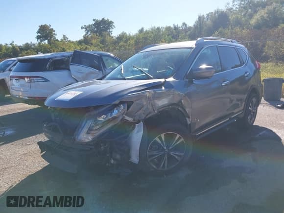 ✅ 2018 Nissan Rogue S • VIN: JN8AT2MT8JW462031 • Lot: 43613795. Listed on IAAI with 70,960 mi. Free auction sales archive from the USA and detailed vehicle history report at DreamBid. Image 2.