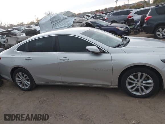 ✅ 2016 Chevrolet Malibu Hybrid • VIN: 1G1ZJ5SUXGF310691 • Lot: 43628393. Listed on IAAI with 166,173 mi. Free auction sales archive from the USA and detailed vehicle history report at DreamBid. Image 13.