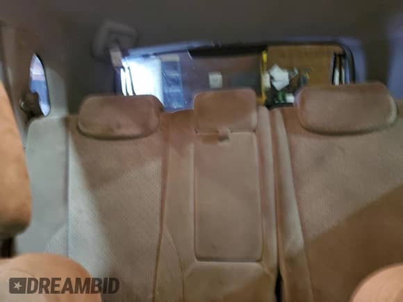 2005 Hyundai Tucson GLS z VIN KM8JN12D35U072088, wystawiony jako Copart lot #65343044 z przebiegiem 191 437 mil mil oraz Szkoda całkowita • Salvage title. Historia ofert i sprzedaży dostępna na DreamBid. Obrazek 10.