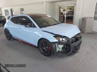 2020 Hyundai Veloster z VIN KMHT36AH1LU004224, wystawiony jako IAAI lot #42292567 z przebiegiem 74 725 mil mil oraz . Historia ofert i sprzedaży dostępna na DreamBid. Obrazek 1.