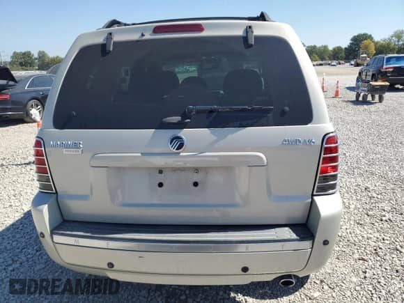 2007 Mercury Mariner Premier с VIN 4M2CU97197KJ07237, выставлен на аукционе Copart как лот 81430055 с пробегом 78 917 миль миль и Списание • Salvage title. История ставок и продаж доступна на DreamBid. Изображение 6.