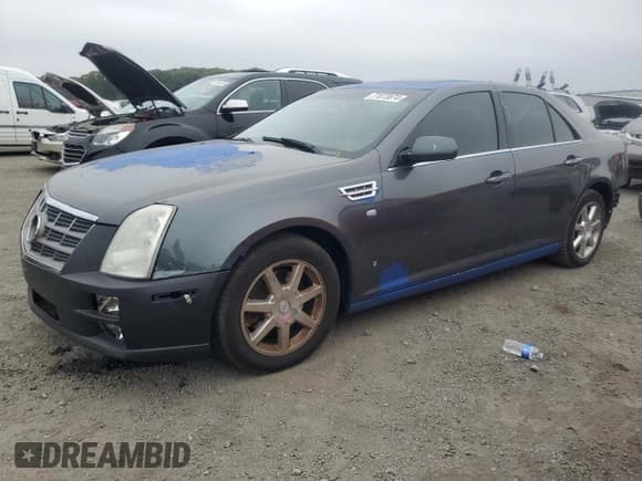 ✅ 2008 Cadillac STS AWD • VIN: 1G6DA67V080198581 • Lot: 71873874. Listed on Copart with 188,229 mi. Free auction sales archive from the USA and detailed vehicle history report at DreamBid. Image 1.