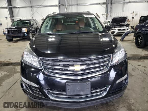 ✅ 2016 Chevrolet Traverse LTZ • VIN: 1GNKVJKD8GJ142463 • Lot: 69590905. Wystawiony na Copart z przebiegiem 127 007 mil. Bezpłatny archiwum sprzedaży aukcyjnych z USA i szczegółowy raport historii pojazdu na DreamBid. Zdjęcie 5.