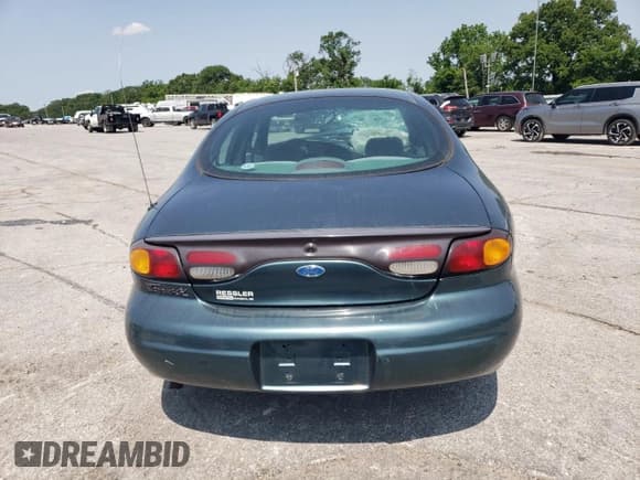 ✅ 1996 Ford Taurus GL • VIN: 1FALP52U8TG278359 • Lot: 83965335. Wystawiony na Copart z przebiegiem 186 708 mil. Bezpłatny archiwum sprzedaży aukcyjnych z USA i szczegółowy raport historii pojazdu na DreamBid. Zdjęcie 6.