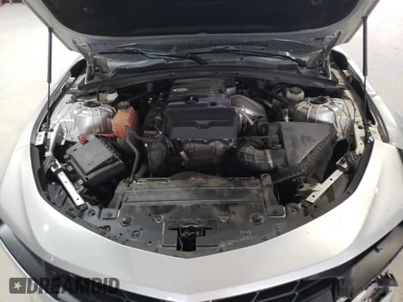 2019 Chevrolet Camaro 1LT с VIN 1G1FB3DX6K0112911, выставлен на аукционе Copart как лот 67308785 с пробегом 83 238 миль миль и Списание • Salvage title. История ставок и продаж доступна на DreamBid. Изображение 11.